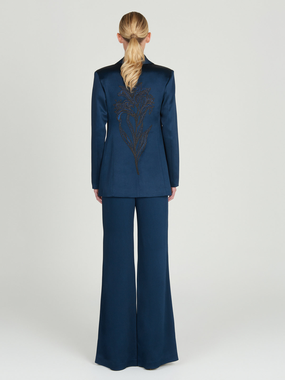 A women's Rebeca jacket Navy with a guipure applique collar.