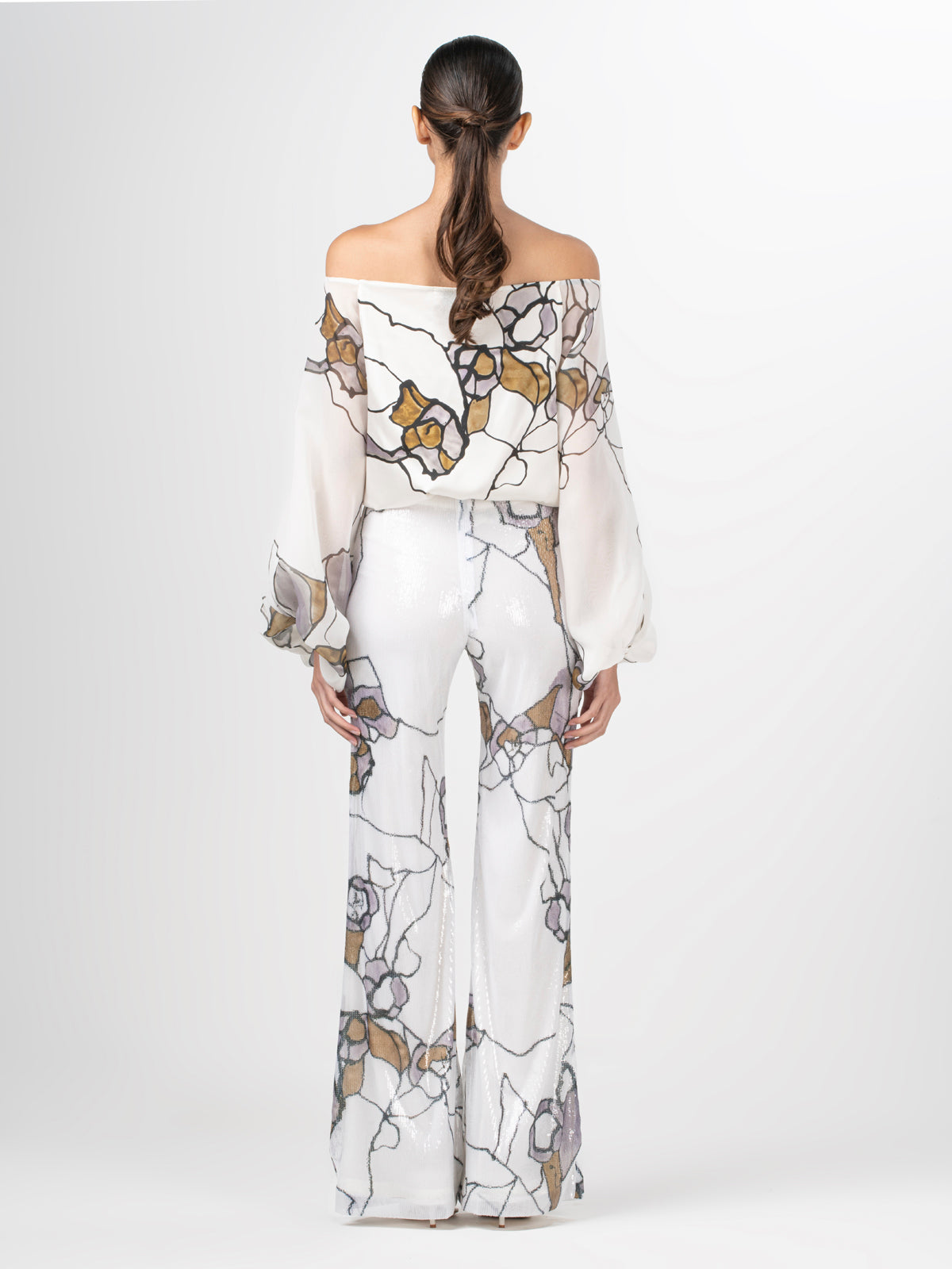 An Aimar Blouse Ecru Marble with silk fabric and an abstract pattern.