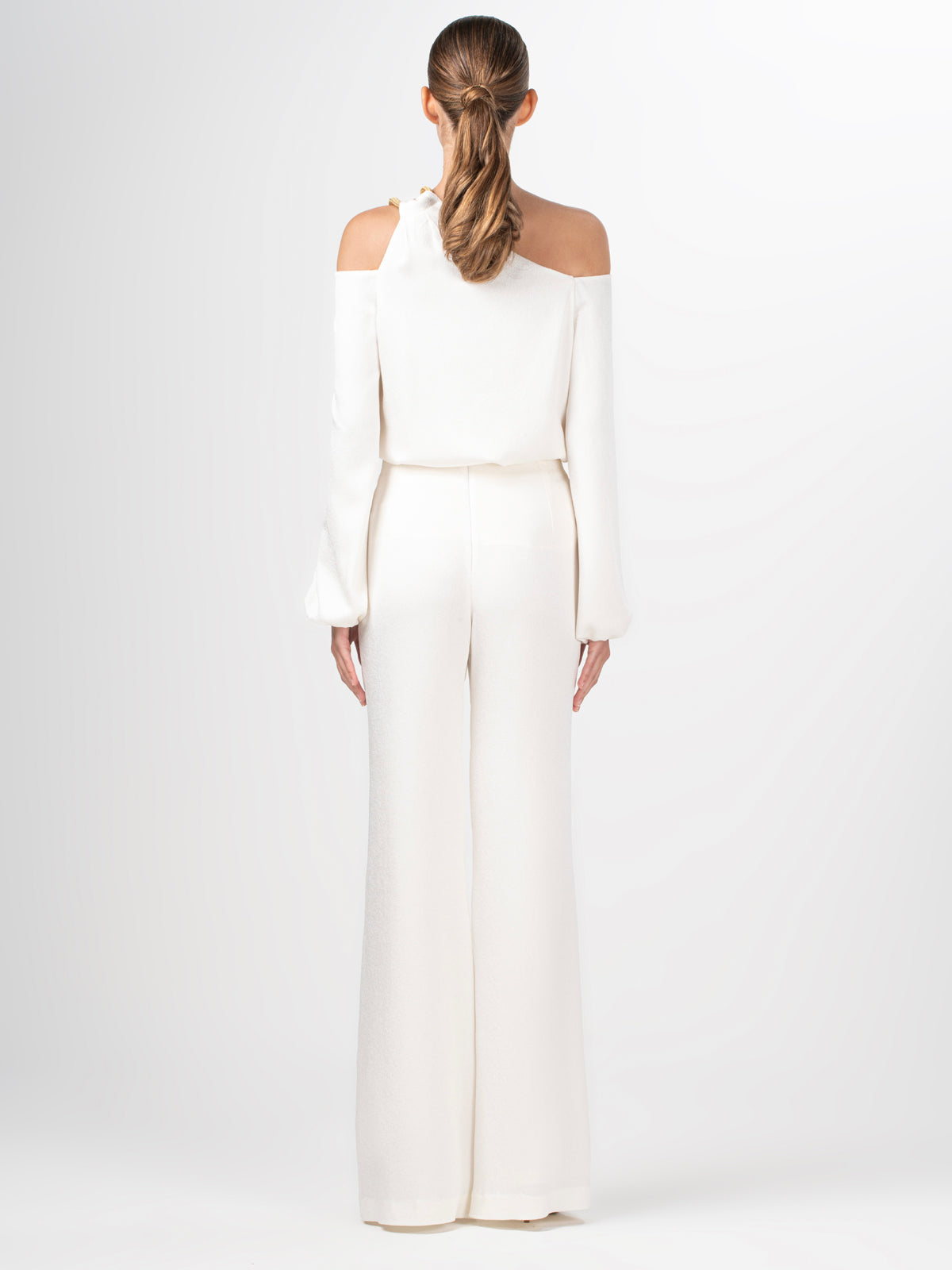 A Barbie Blouse White with gold metallic detailing on the sleeve.