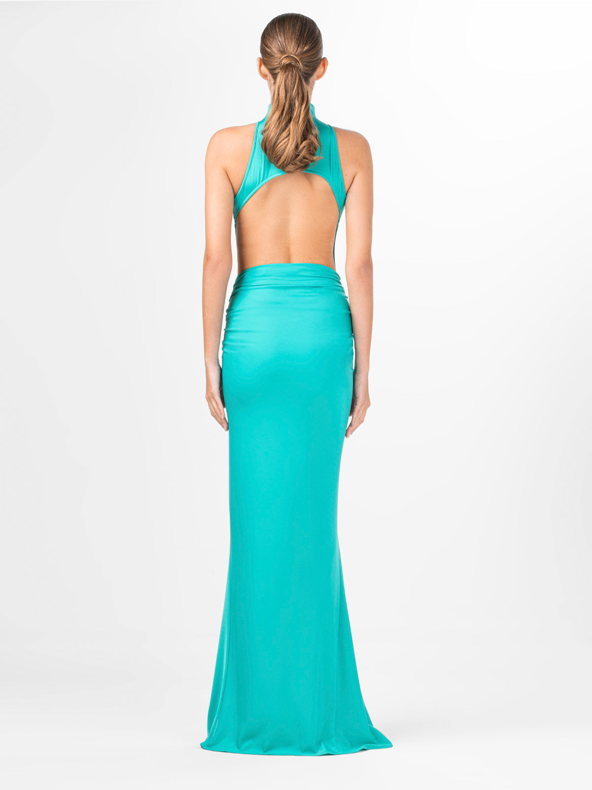 A teal Claudia Skirt Aqua with an asymmetric waistline.