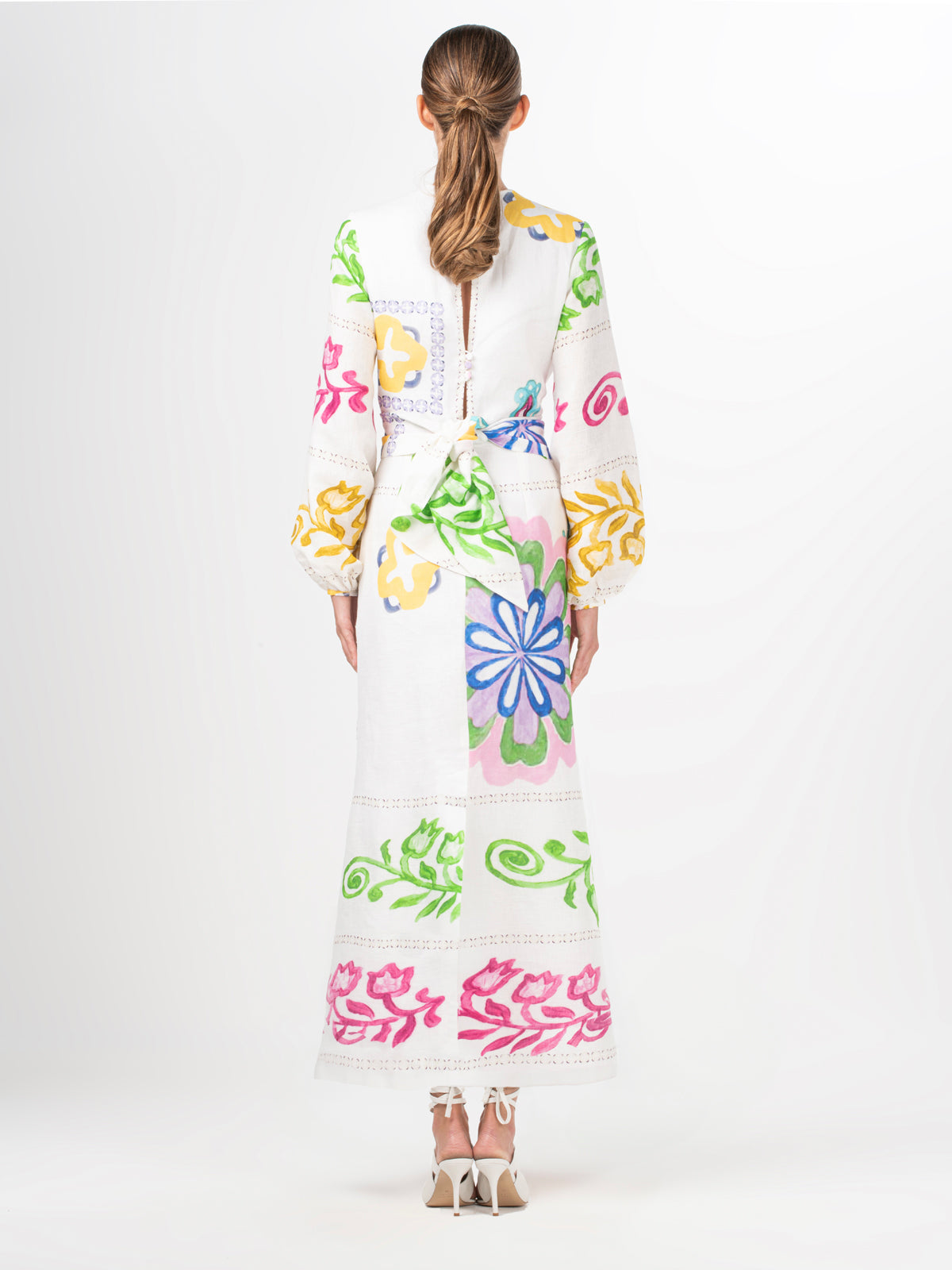 A Battia Dress Multicolor Floral Print with abstract multicolor print flowers on linen fabric.