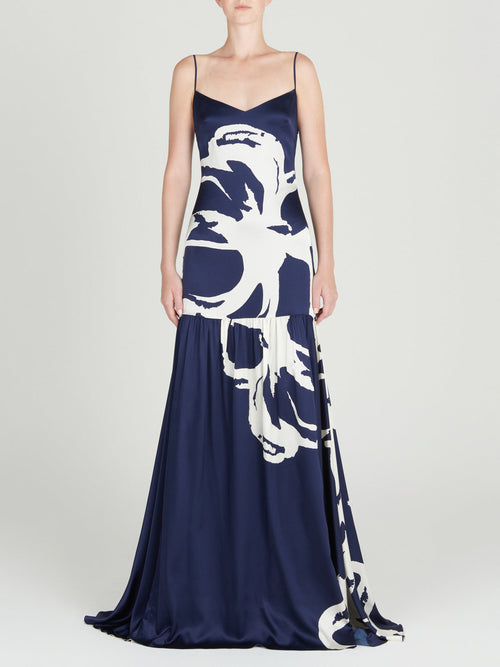 A Bari Dress Midnight Bloom with a floral design on it.