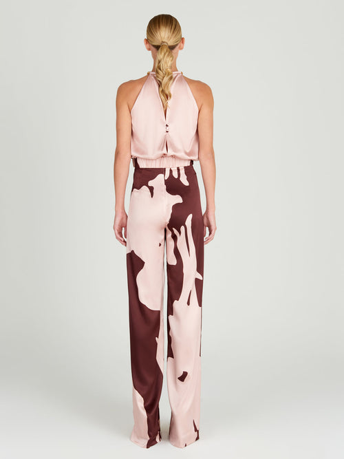 Guspinii Blouse Cacao Floral with an elastic adjustable hem.