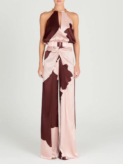 Guspinii Blouse Cacao Floral with an elastic adjustable hem.