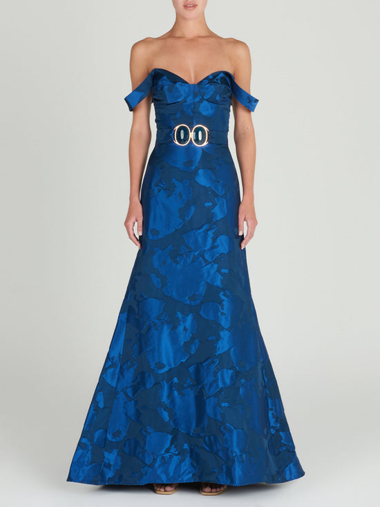 A high waist Tirene Skirt Navy with a floral pattern.