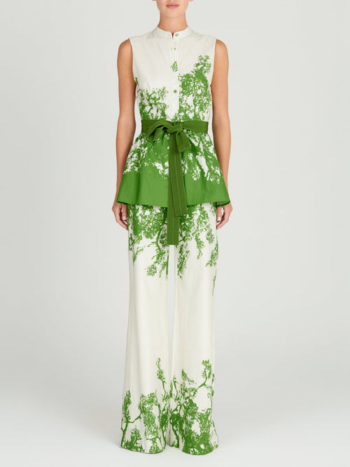A Colony Blouse Green Cyprus in green and white with a green belt, made of cotton.