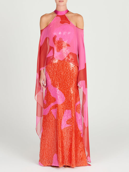 An elegant Lodi Dress Vermillion on a mannequin.