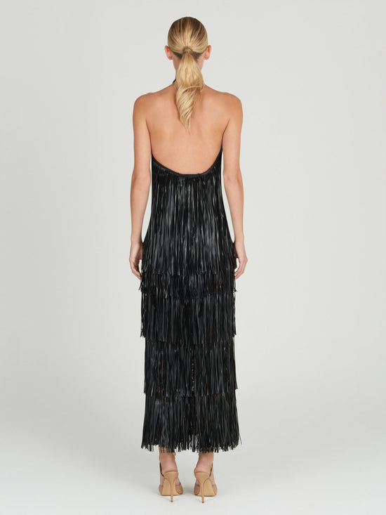A Susa Dress Black on a mannequin.