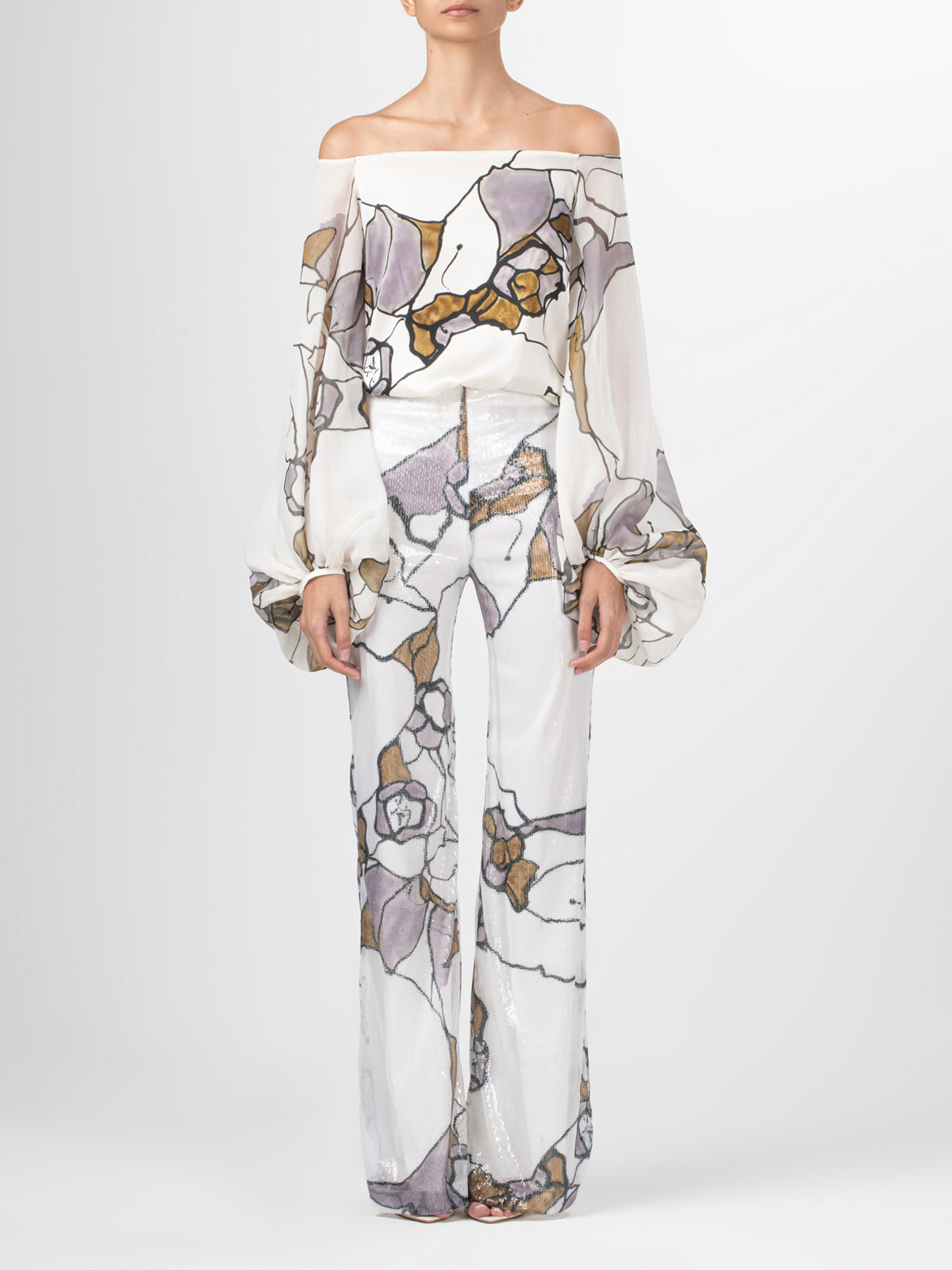 An Aimar Blouse Ecru Marble with silk fabric and an abstract pattern.