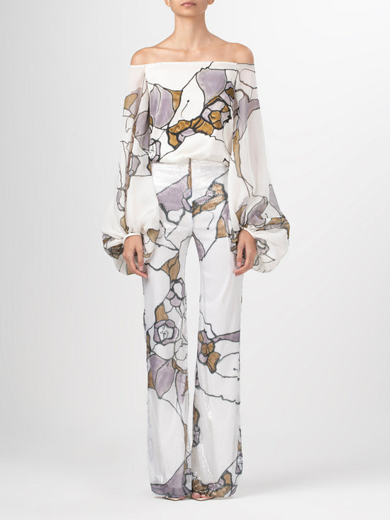 An Aimar Blouse Ecru Marble with silk fabric and an abstract pattern.