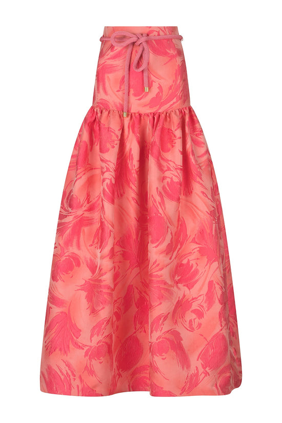 A Teodora Skirt Fuchsia Pink with a bow at the waist in textured jacquard fabric.